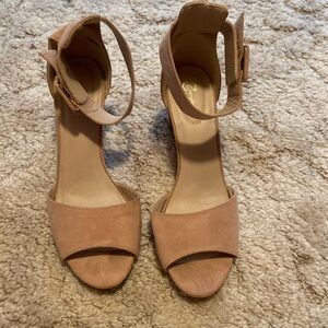 Nice nude colored heals worn a few times, like new.